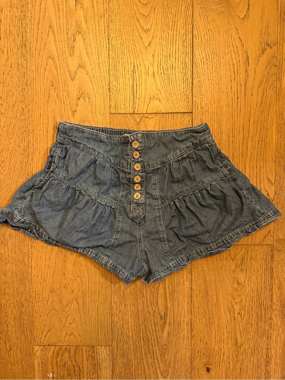 We The Free Washed Blue Ruffle Denim Shorts